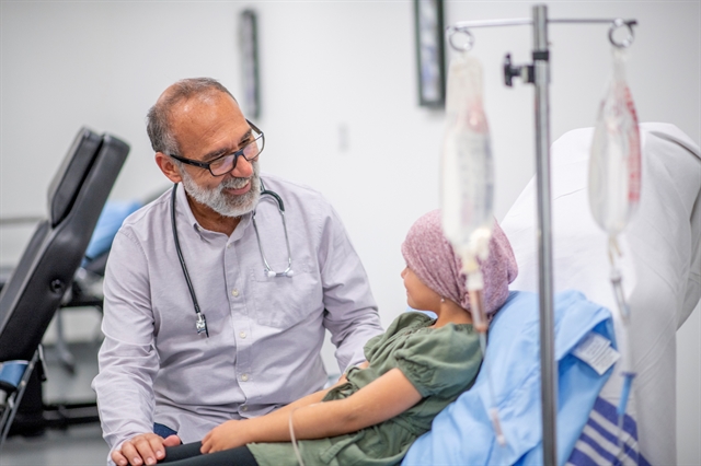 Doctor and Pediatric Cancer Patient